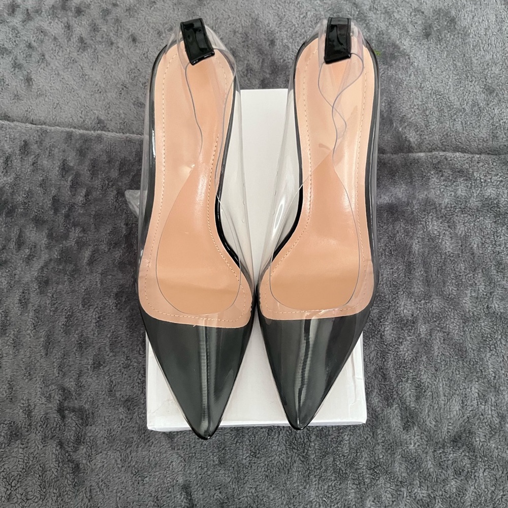 Clear and black stiletto heels